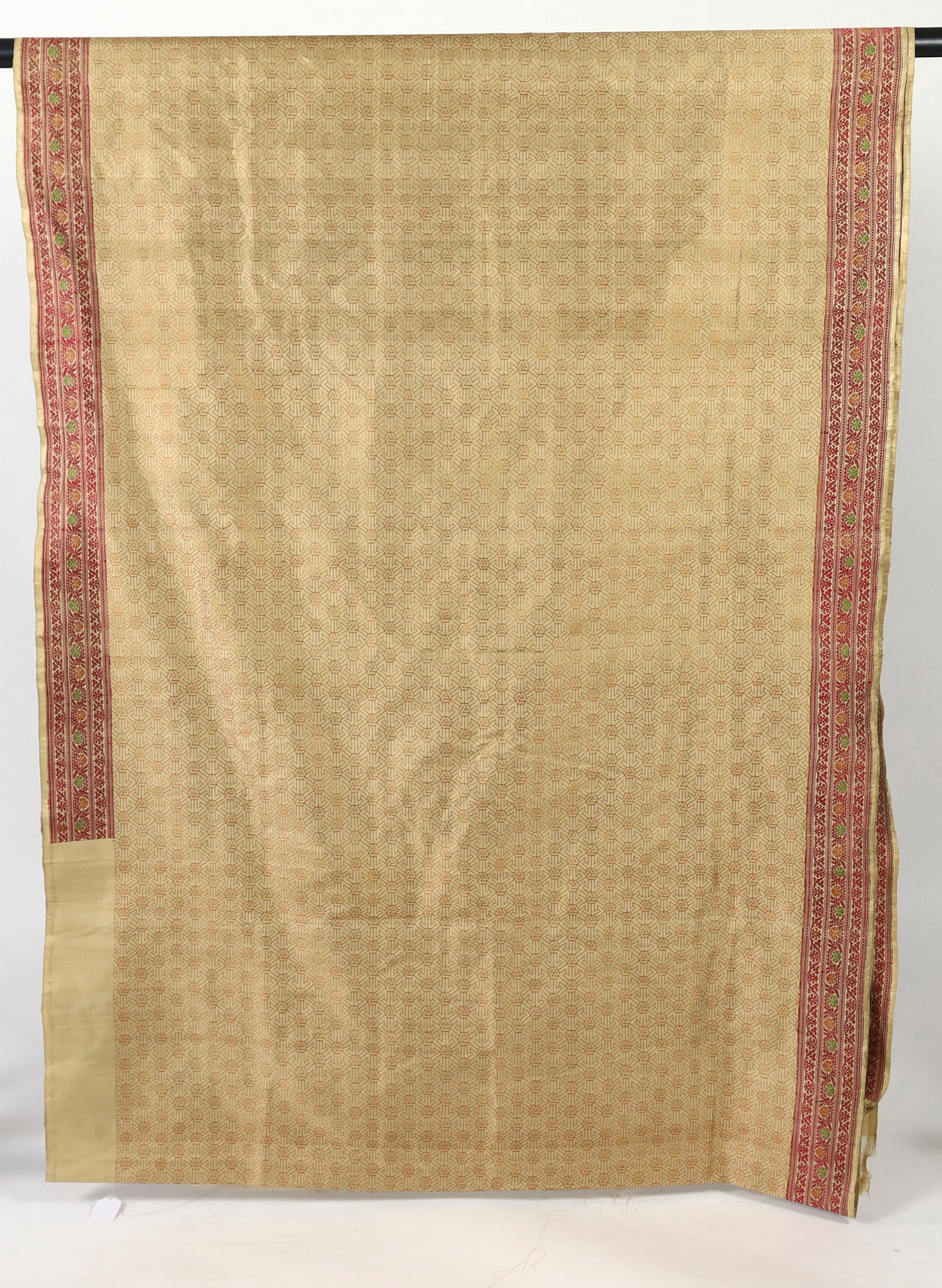 An Indian Varansi, 1980’s, hand woven silk sari by Mohammad Jafar Ali, woven in traditional style as a wedding sari, unused, 620cm long, 115cm wide, comes with provenance